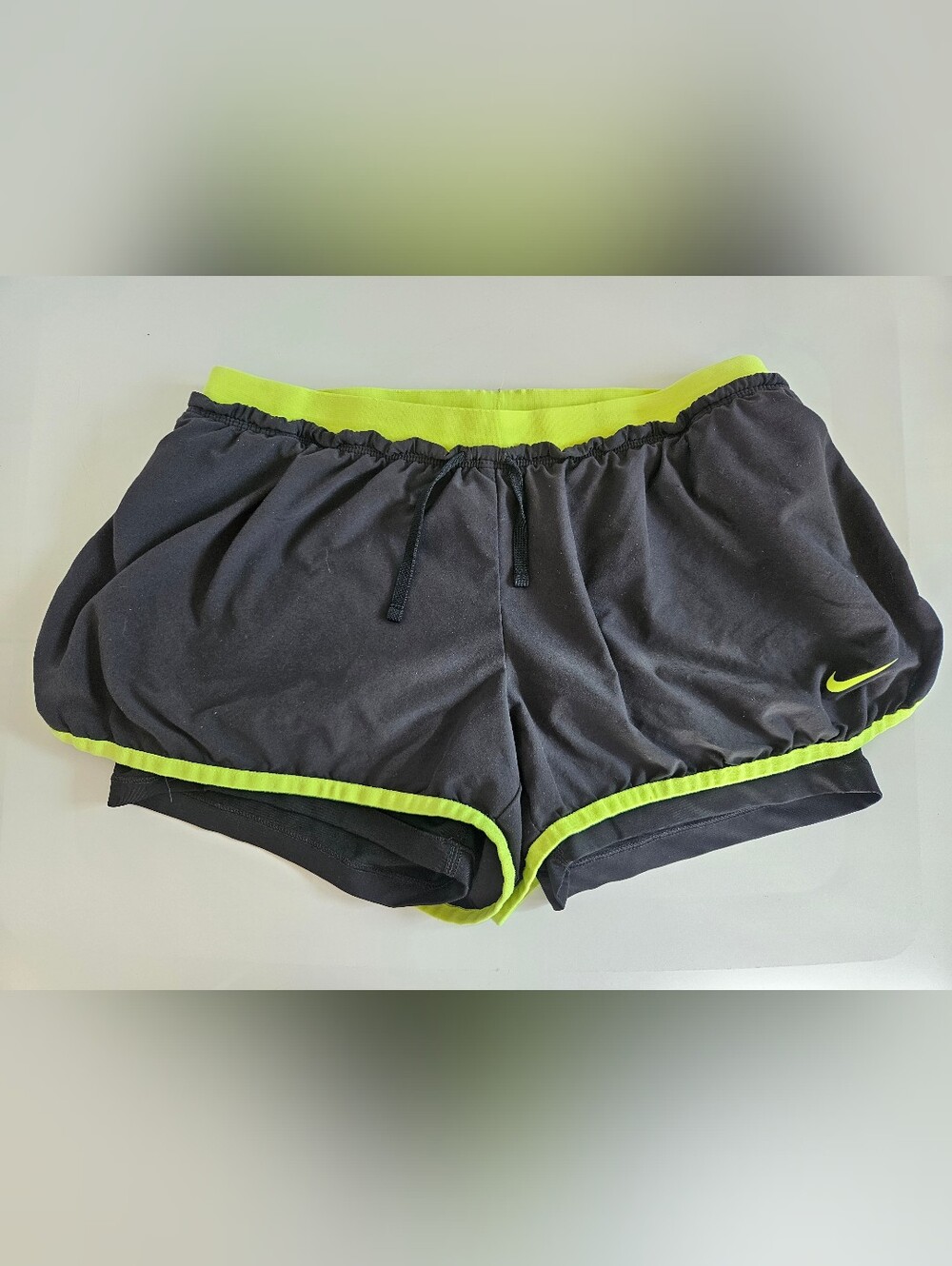 Nike Women’s Black Shorts with Neon Green Trim